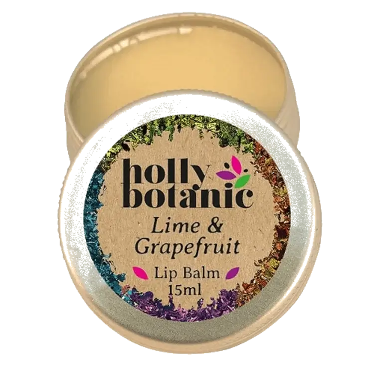 Lime and grapefruit natural lip balm in 15ml tin, lid open.