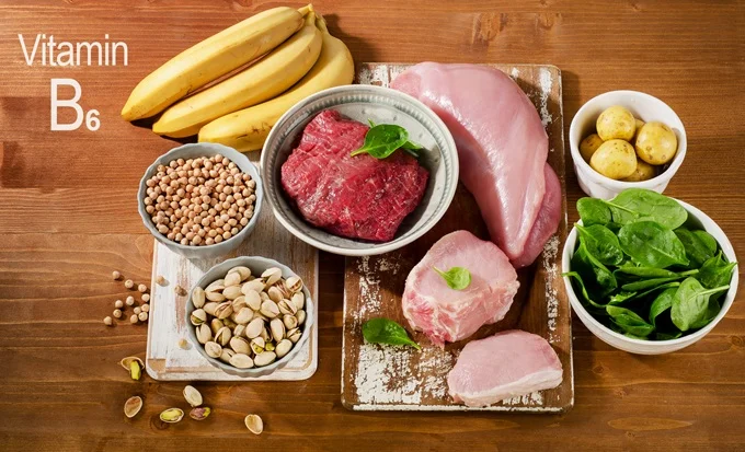Foods containing Vitamin B6 include chicken, bananas, nuts and avocado.