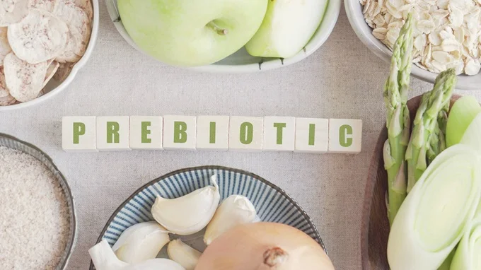 Prebiotic foods include leeks, garlic, bananas, oats and wheat to improve gut health.