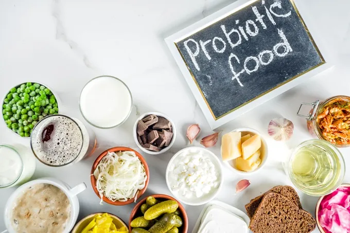 Probiotic foods include kimchi, sauerkraut, kombucha and kefir to improve gut health.