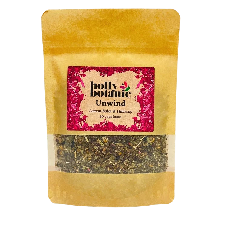 Unwind tisane by Holly Botanic, lemon balm and hibiscus to relax and calm, 40 cup loose. Recyclable packaging.