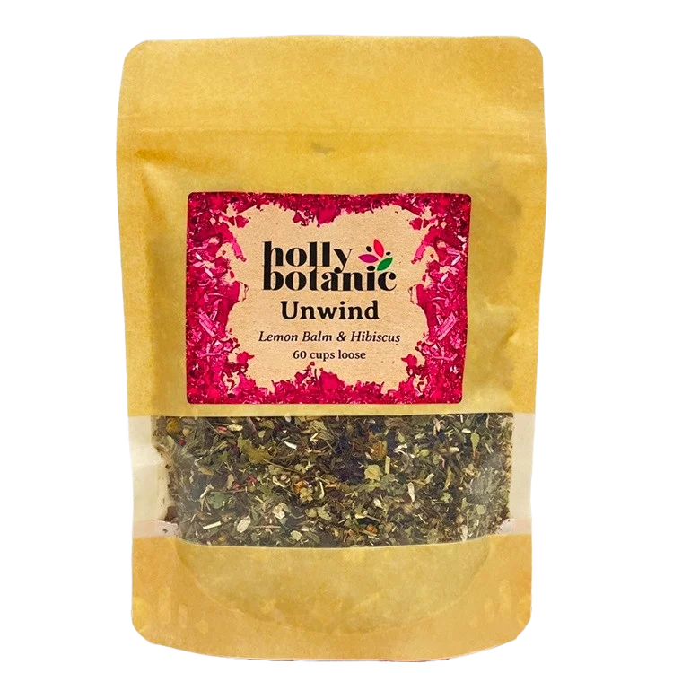 Unwind tisane by Holly Botanic, lemon balm and hibiscus to relax and calm, 60 cup loose. Recyclable packaging.